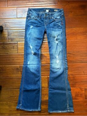Silver Jeans Distressed Faded Blue Flare Jeans